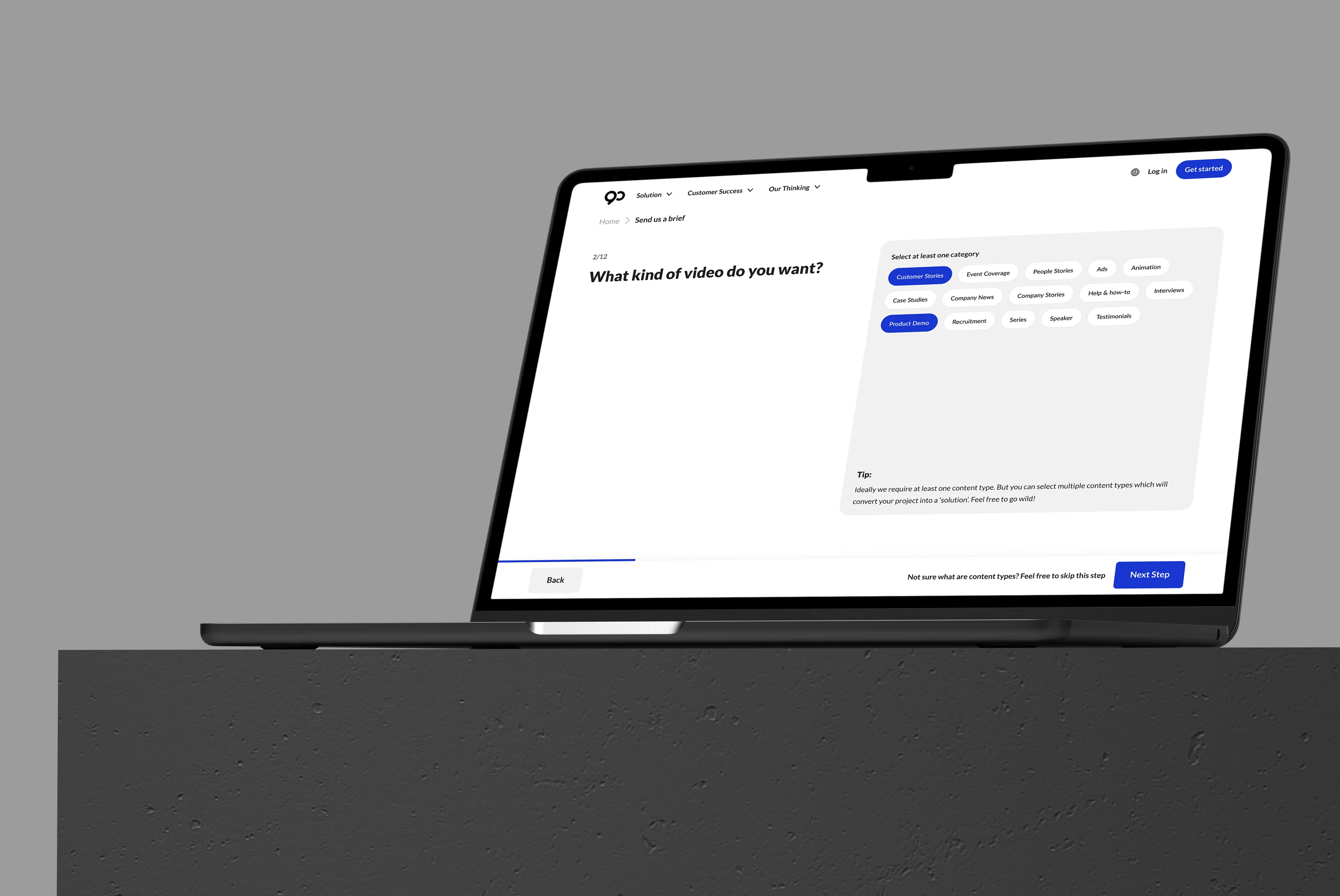 90 Seconds custom order flow on a laptop. The screen asks what kind of video the customer wants, with selectable content-type chips, progress navigation, and a next-step action in a clean ordering interface.